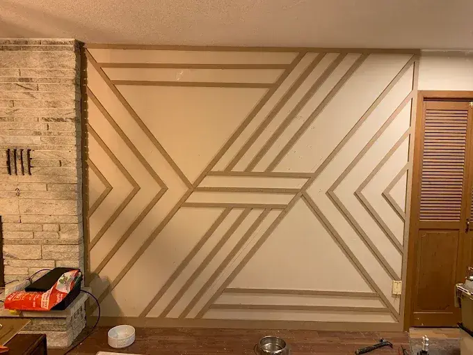 Geometric custom feature wall trim installation